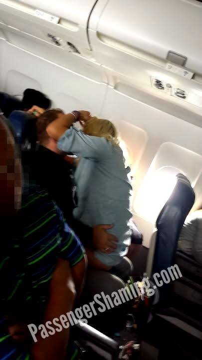 "A couple are caught canoodling during a flight."